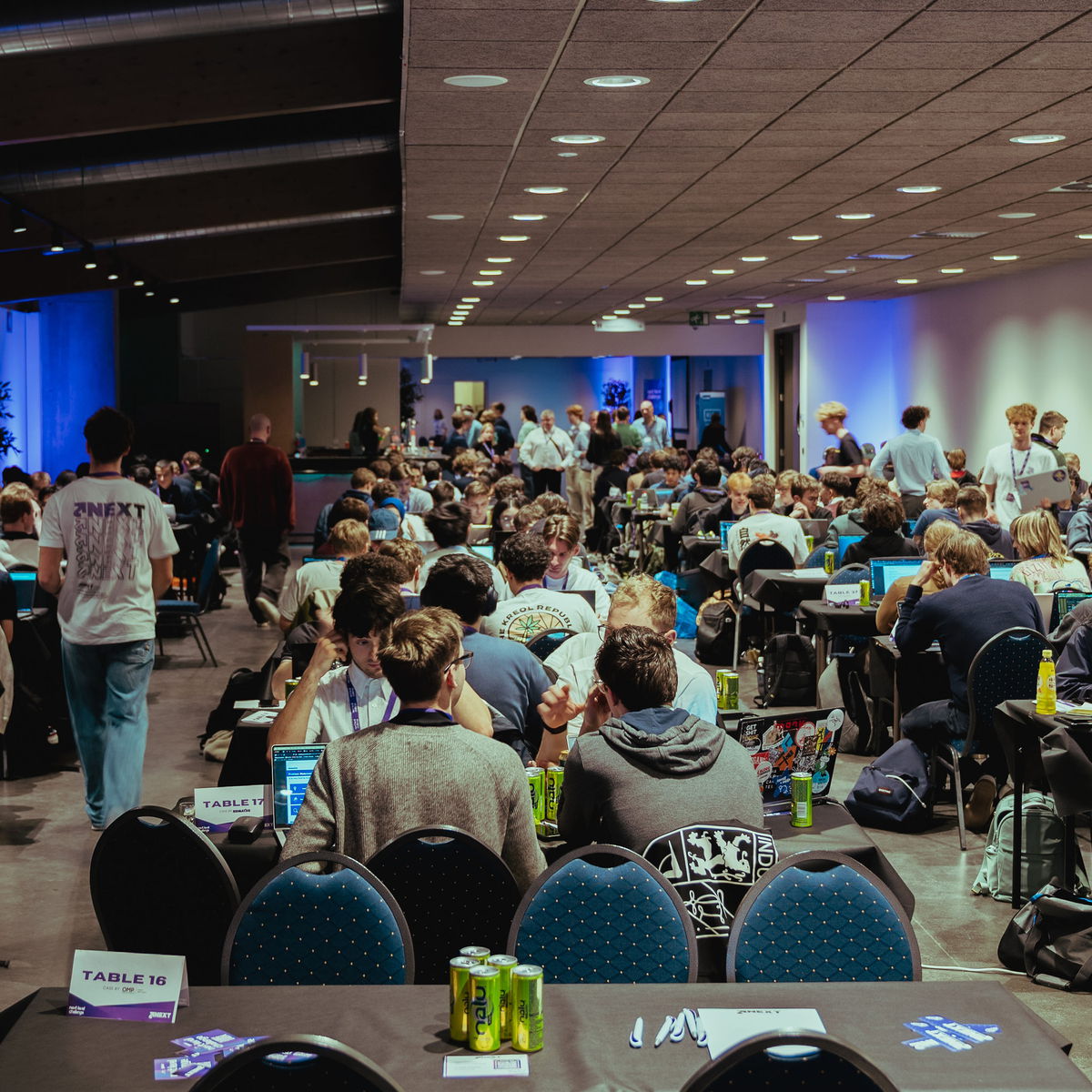 The main hall packed with teams working at their laptops