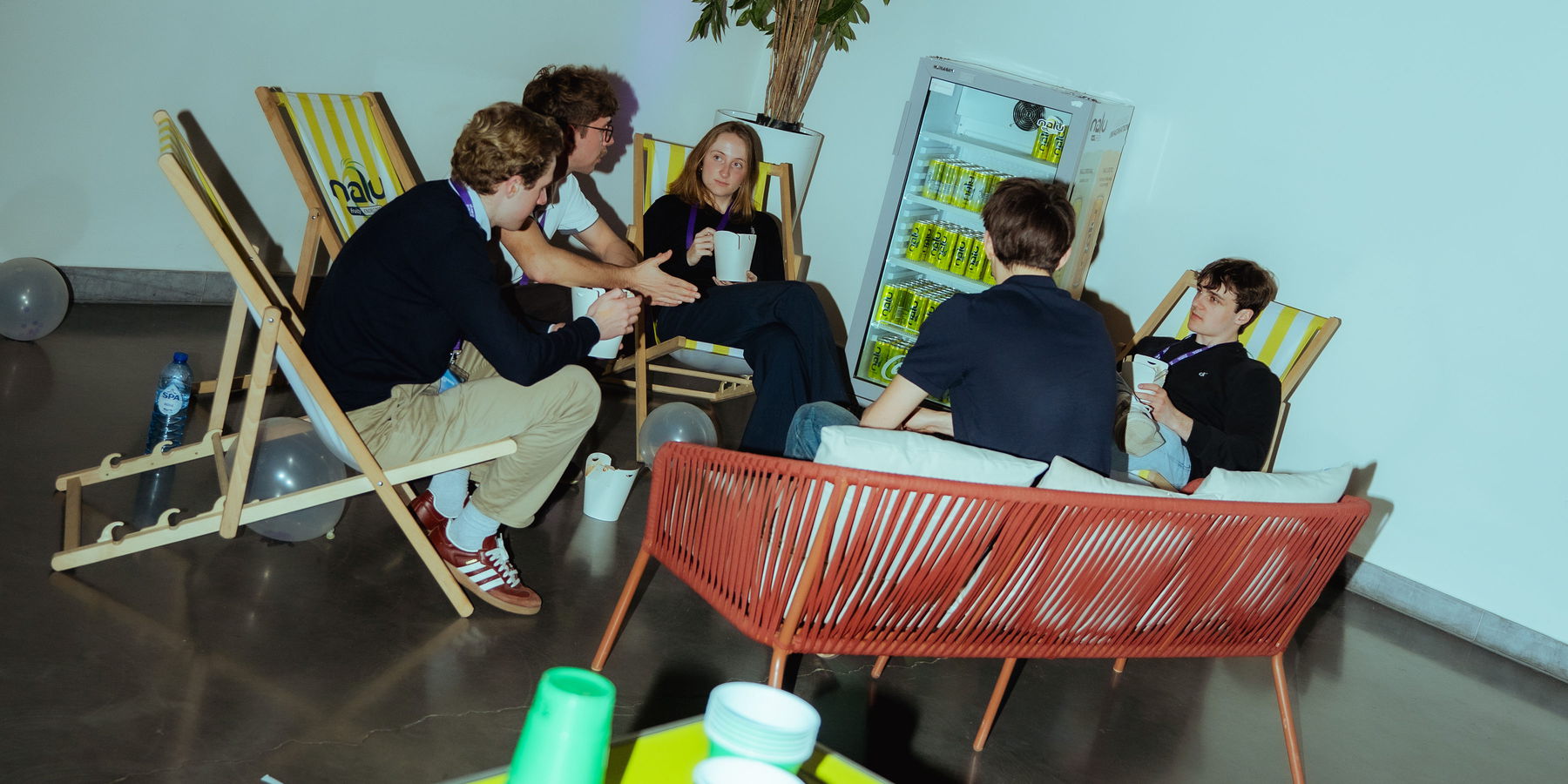 Participants relaxing in the lounge area between work sessions